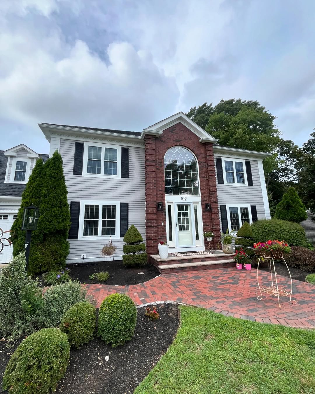 Colonial home — full exterior with new siding and trim