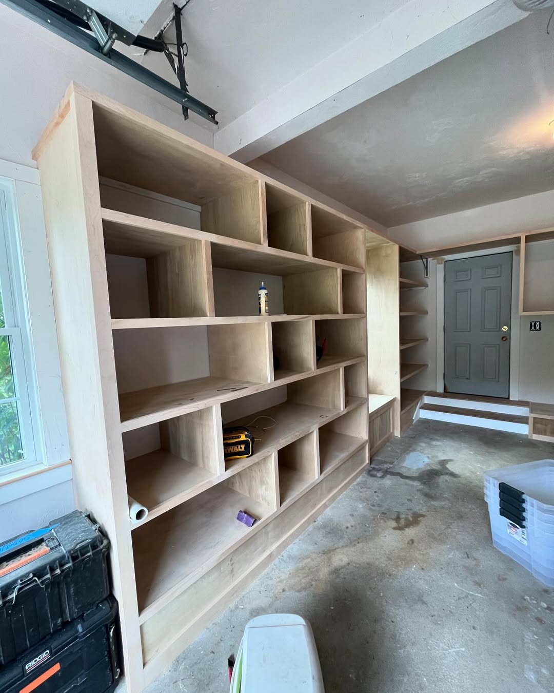Custom plywood cubby unit — garage built-in storage