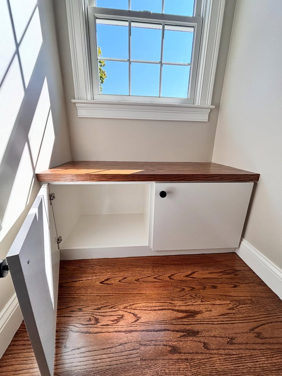 Built-in storage bench — interior detail with concealed hinges